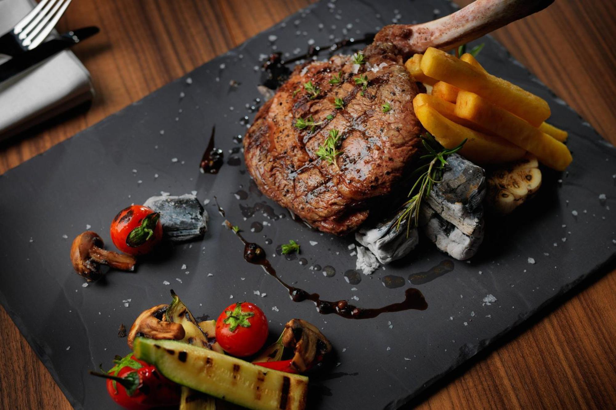 Baku Marriott Hotel Boulevard Exterior photo A steak prepared with a steak knife